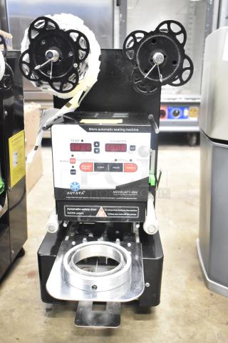 Autata ATT-95N automatic plastic cup sealing machine, 115 volts, 1 phase. Features LCD display, control buttons. Model: ATT-95N.