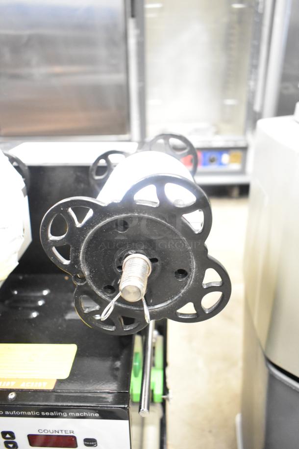 Autata ATT-95N Automatic Plastic Cup Sealing Machine in good condition, 115 Volts, 1 Phase, with control panel.