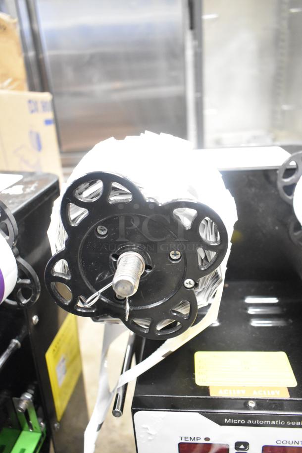 Autata ATT-95N Automatic Plastic Cup Sealing Machine, 115V, 1 Phase, shown with integrated film roll holder, control panel visible.