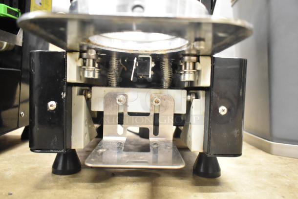 Autata ATT-95N cup sealing machine, 115V, 1 phase. Front view showing metal and plastic components, in used condition.