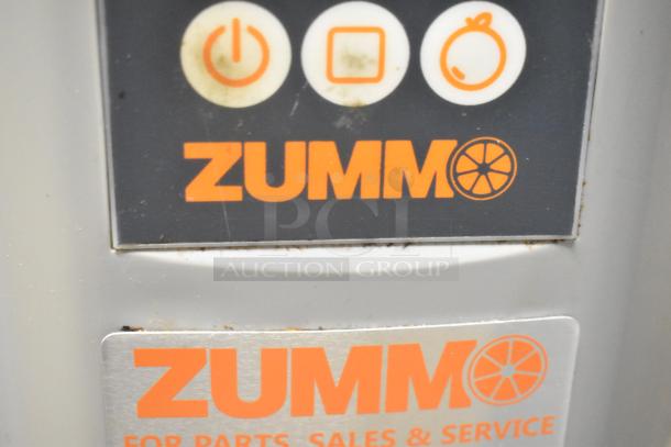 Zummo Z14C citrus juicer panel with power icons and Zummo logo. Features include 110 volts, 1 phase operation, commercial use.