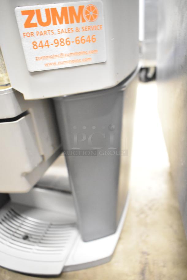 Zummo Z14C Commercial Citrus Juicer, 110V, 1 Phase. Visible service label with contact info. Good condition.