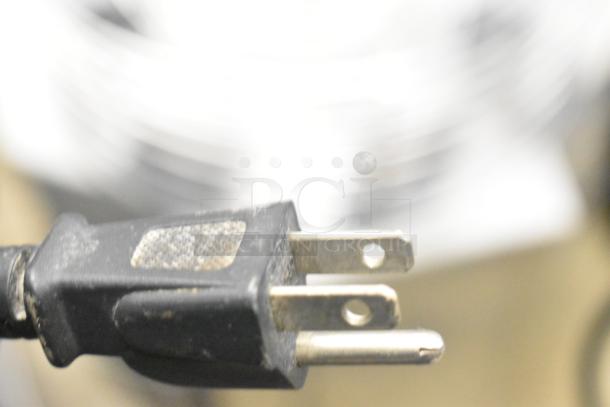 Power plug for Zummo Z14C Commercial Countertop Citrus Juicer, 110 volts, 1 phase, showing wear.