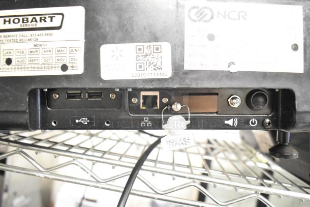 2017 Hobart HTi-7LH26 commercial food scale; metal countertop model. Lacking power cord. Labels show service contacts.