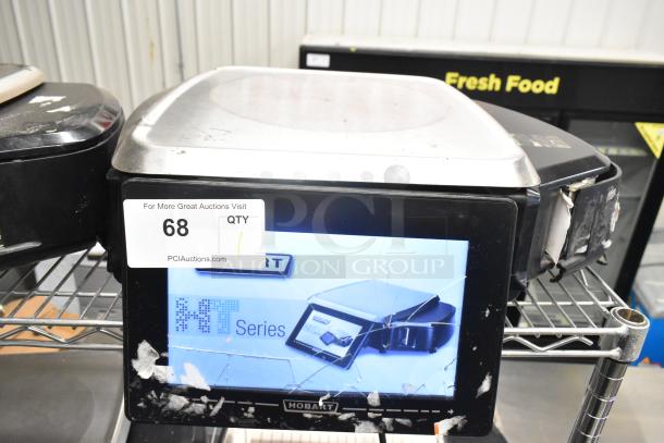 2017 Hobart HTs-LS26 Metal Commercial Food Scale, tested and working. Visible screen cracks, auction tag labeled "68 QTY."