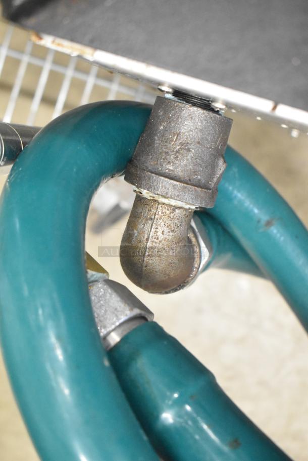 Motak Commercial Gas Stock Pot Range, single burner, metal pipe and hose connections visible, good condition.