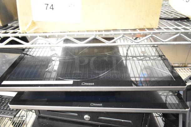 Lot of 10 items includes 2 cash drawers, 5 Toast POS monitors, some damaged. Various condition, potential for repair.