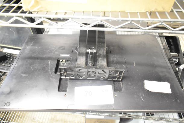 POS monitor backside showing mounting bracket and ports, minimal wear, label indicating quantity "70."