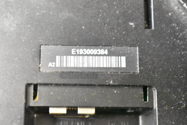 Barcode label showing "E193009384", indicating inventory or model number for auctioned items.