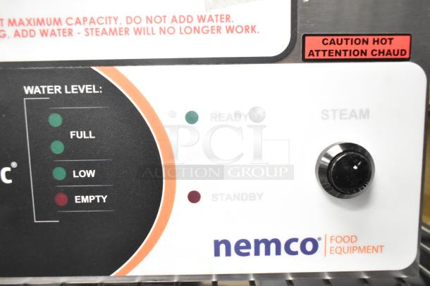 2023 Nemco 6625B Fresh-O-Matic countertop rethermalizer and steamer control panel with water level indicator and caution label.