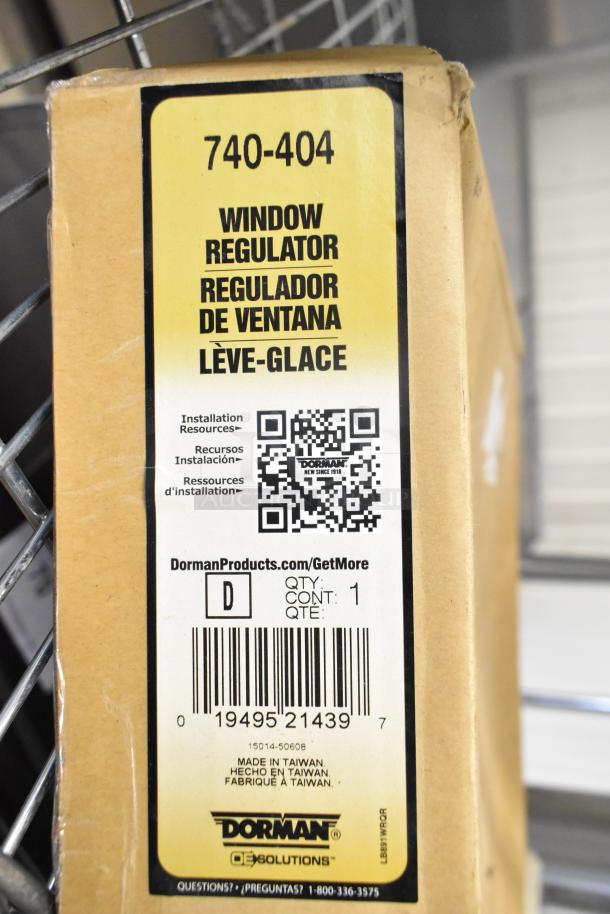 Dorman 740-404 Window Regulator box with label details. New condition, scratch and dent. Includes installation resources. Made in Taiwan.