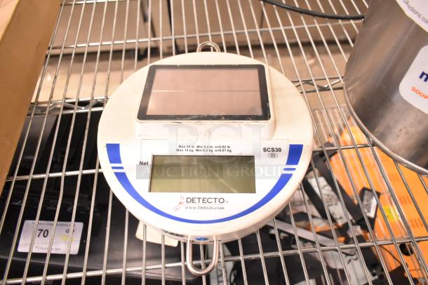 Detecto SCS30 hanging scale, 30 lb. capacity, white with blue accents, digital display, solar powered, good condition.