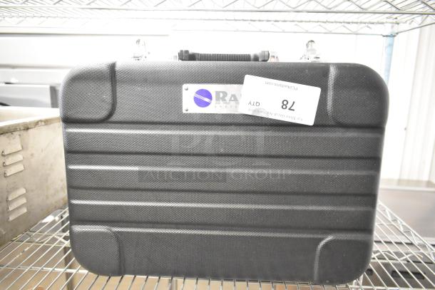 Rae Hard Case, black, textured surface, sturdy metal clasps, handle on top, Rae Systems logo tag, auction tag labeled "78".