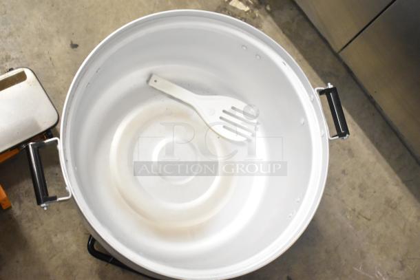 Emperors Select 478EGRC140LP propane rice cooker, 140-cup capacity, shown open with spatula inside, good condition.