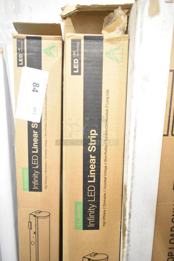 7 new Alphalite Infinity LED Linear Strips in boxes, scratch and dent condition, high efficacy, dimmable, universal voltage.