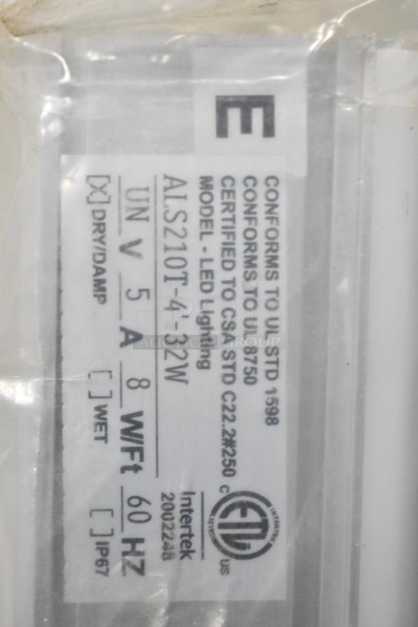 Label on Alphalite Infinity LED Linear Strip, model ALS210T-4-32W, conforms to UL STD 1598, certified CSA STD C22.2.