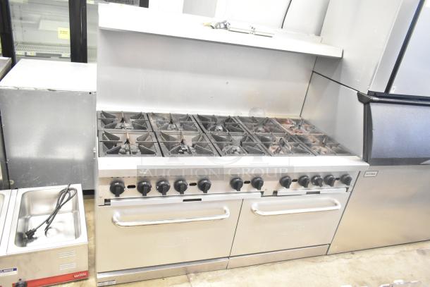 Mainstreet 541E60N, 10 burner natural gas range with 2 ovens, over shelf, and back splash. Slight wear, commercial use.