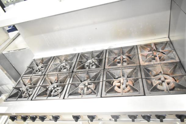 2025 Mainstreet 541E60N commercial range, 10 burners, 2 ovens, overshelf, backsplash, natural gas, used condition.