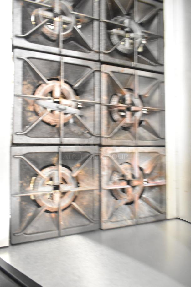 2025 Mainstreet 541E60N commercial range, 10 burners, dual ovens, with overshelf and backsplash. Natural gas powered.