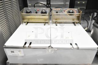 VH1118 countertop electric 2-bay fryer with lids, 110V, 1-phase. Control knobs and indicators visible, showing wear.