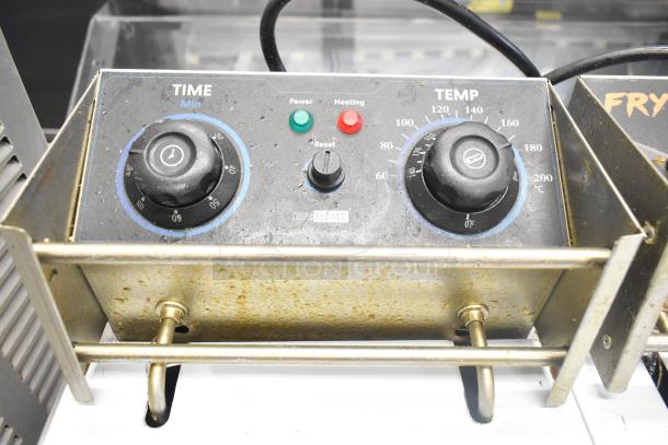 VH1118 2-bay electric fryer control panel, black knobs for time and temperature, power and heating indicators. 110V, used condition.