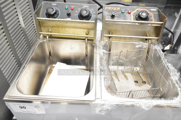 VH1118 countertop electric 2-bay fryer with 2 lids, model VH1118. 110 volts, single phase. Features visible temperature controls.