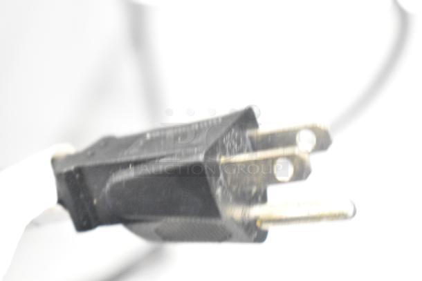 Close-up of a black electrical plug for VH1118 Countertop Electric Fryer, 110 volts, 1 phase.