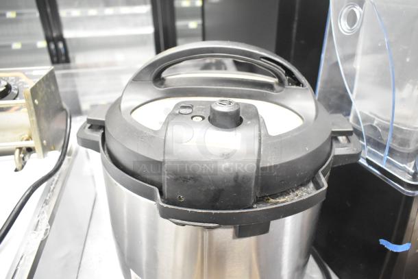 Instant Pot Duo 80 v5 electric pressure cooker, stainless steel, 120 Volts, lightly used condition, minor surface marks.