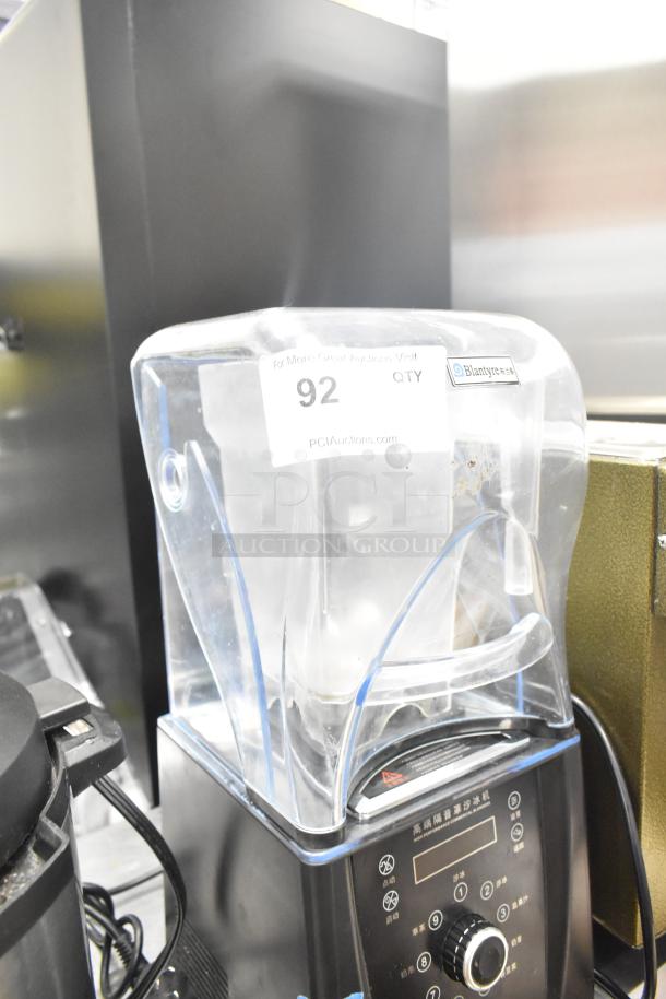 Blantyre Q8 Countertop Blender with sound enclosure and two pitchers, 220 volts, 1 phase, visible brand label and auction tag.