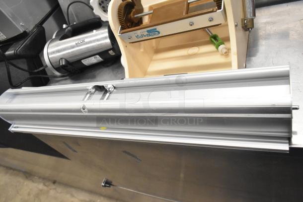 Four various items including Antree meat grinder attachment and Aicok HM833 hand blender. Visible components and labels.