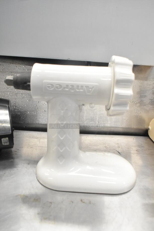 Antree meat grinder attachment, white, with diamond-patterned handle, visible brand logo, in good condition.