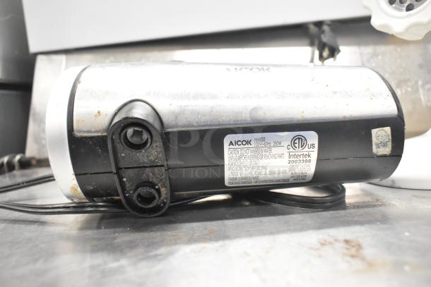 Aicok HM833 hand blender, 120V, 250W, visible label with safety instructions, lightly worn condition.