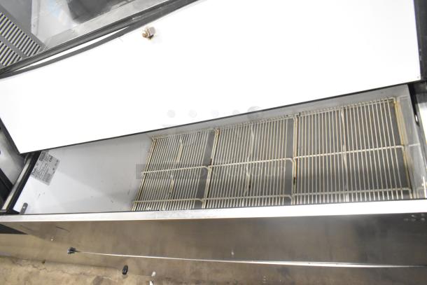 True TMC-58-S Commercial Milk Cooler, 115V, 1 Phase. Features a stainless steel exterior and internal wire racks.