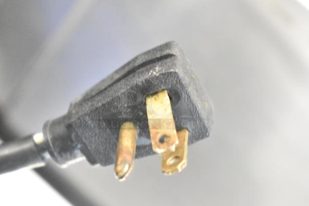 Close-up of an electrical plug for True TMC-58-S Commercial Milk Cooler, 115 volts, 1 phase.