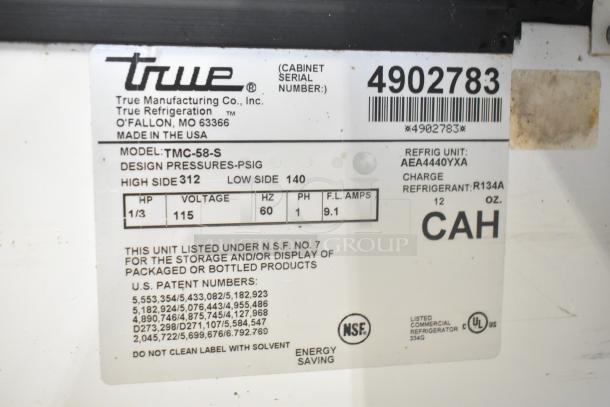 True TMC-58-S Commercial Milk Cooler label, 115V, 1 Phase, features design pressure info and refrigerant details.
