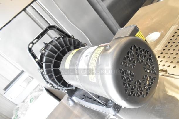 Pacer Baldor SuperE Motor, 230/460V, 3 Phase; features robust design, visible caution label. Suitable for industrial use.