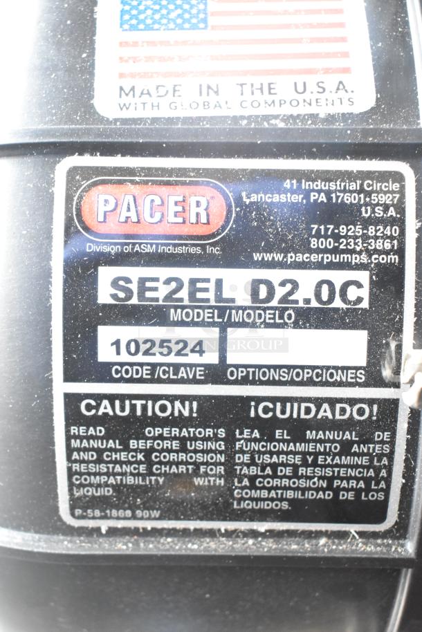 Pacer Baldor SuperE Motor label, model SE2EL D2.0C, 230/460 volts, 3-phase, with cautionary text and company details.