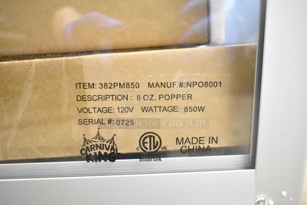 Brand new Carnival King 382PM850 8 oz. popcorn machine. Scratch and dent. 120V, 850W. Serial #0725, made in China.