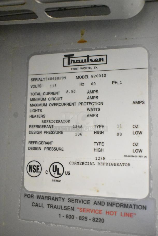Traulsen G20010 commercial 2 door reach-in cooler label, 115 volts, 1 phase, NSF and UL certified, model details shown.