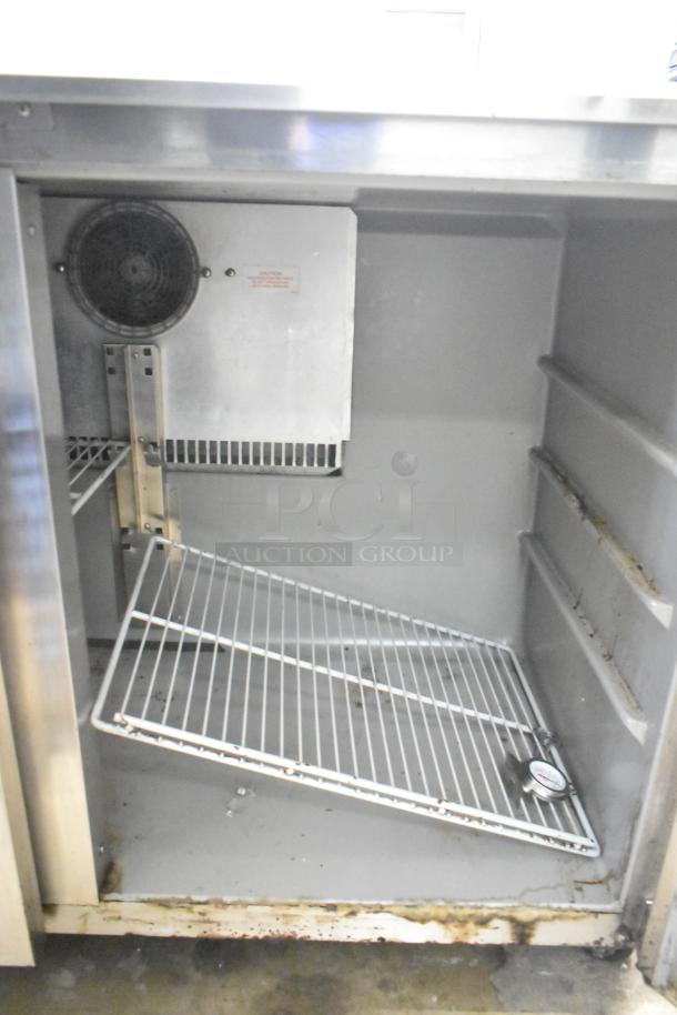 Victory UR-48-SST commercial undercounter cooler, 2 doors, interior shelving, 115 volts, signs of wear, used condition.