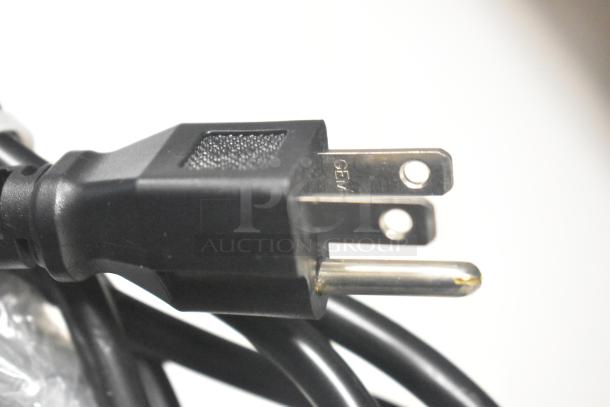 Close-up of a power plug for the Avantco 360CPT54 Commercial Countertop Refrigerated Rail, 115 Volts.