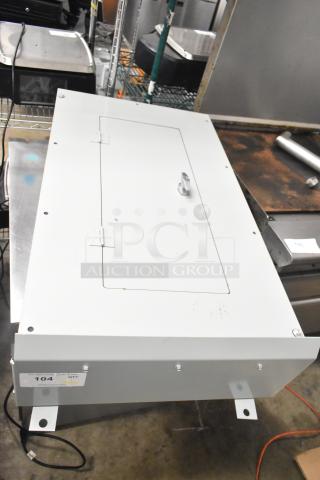 Steel cabinet with bracket hinge sets, white finish, includes mounting bracket. Visible label with auction details.