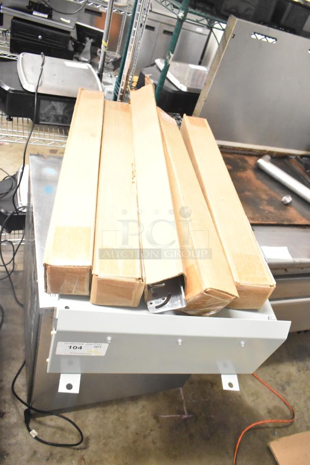 Cabinet with bracket hinge sets, new condition. Includes boxed hinge sets. Label reads "104 PCLiquidators."