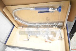 Brand new Waterloo 750PRD8X deck-mounted pre-rinse faucet, 1.15 GPM, 8" centers, in box, with slight scratch and dent.