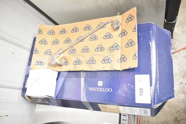 BRAND NEW SCRATCH AND DENT Waterloo 750PRD8X 1.15 GPM deck-mounted pre-rinse faucet with 8" centers in original packaging.