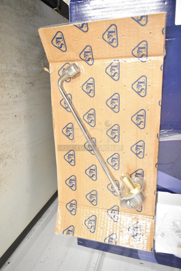 Brand new Waterloo 750PRD8X 1.15 GPM deck-mounted pre-rinse faucet, 8" centers, minor scratches, original packaging.