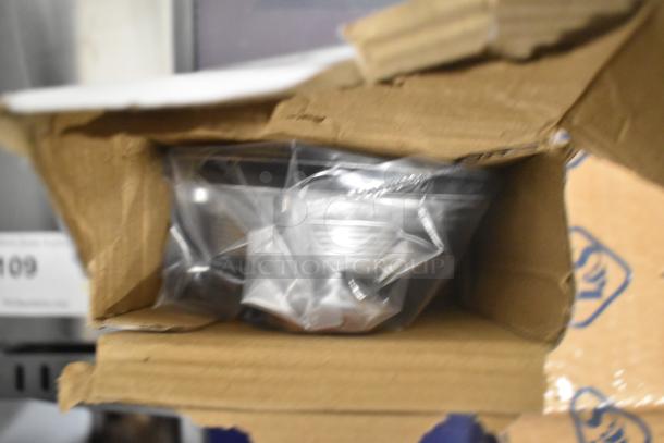 Brand new Waterloo 750PRD8X pre-rinse faucet, 1.15 GPM, deck-mounted, 8" centers, visible in box, minor scratches and dents.