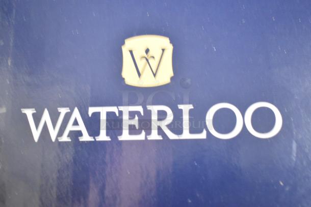 Brand new Waterloo 750PRD8X deck-mounted pre-rinse faucet, 1.15 GPM, 8" centers, scratch and dent condition, logo visible.
