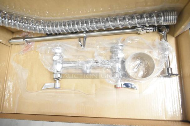 Brand new Waterloo 750PRD8X pre-rinse faucet, deck-mounted, 8" centers, 1.15 GPM, chrome finish, with minor scratches.