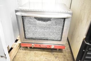 Brand new Avantco 177CO28M countertop convection oven, 2.3 cu. ft., broken glass door, 208/240V, 1 phase.